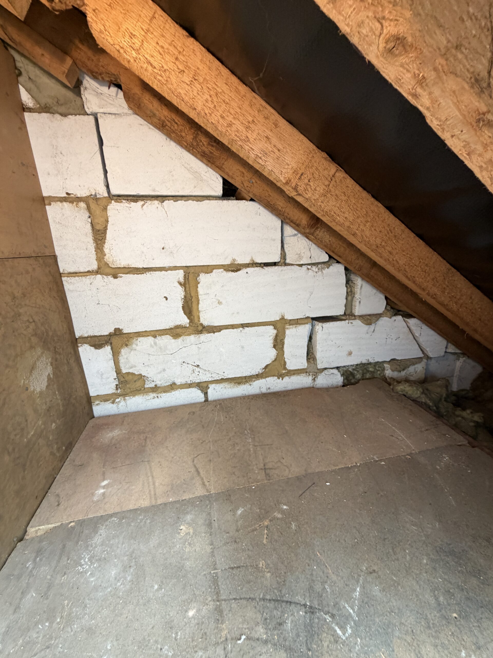 Interior roof void showing timber structure and insulation
